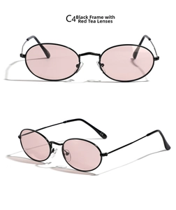 Vista detallada de gafas de sol ovaladas retro con montura de metal negro y lentes rosa