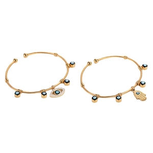 Golden twisted Hamsa Hand and Evil Eye open bracelet with blue crystal accents