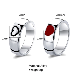 Detailed specs of alloy heart rings showing 0.7cm width and 8g weight for couples
