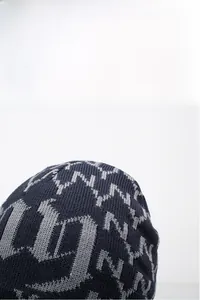 Detail shot showing the thick knit texture and fleece lining of the winter beanie hat