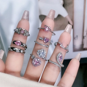 Exquisite silver ring set with pink zirconia and heart-star motifs for elegant women