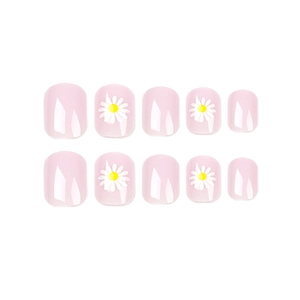 Glossy light pink press-on nails set featuring white daisy patterns and simple floral designs