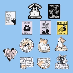 Collection of twelve creative enamel cat pins with humorous English slogans and cat motifs