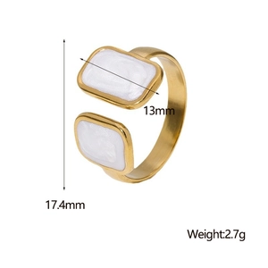 Detail view of 18K gold plated geometric ring with white enamel and size measurements