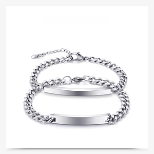 Detail of silver Cuban chain bracelets with customizable rectangular polished plaques