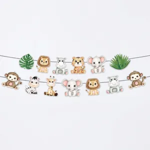 Close-up of jungle animal party banner with cartoon lion tiger and palm leaves