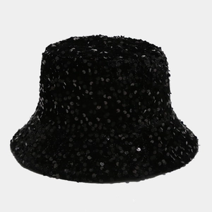 Close-up of black sequins on a reversible bucket hat showing reflective texture