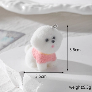 White flocked Bichon dog charm in pink clothes with size measurements and metal hook