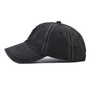 Distressed washed cotton baseball cap with vintage embroidery and worn-out brim details