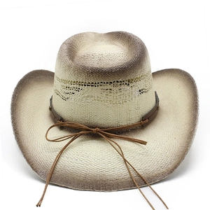 Close-up of woven straw texture with brown gradient edge and faux leather band detail