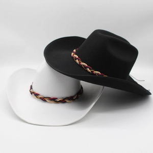 Detail of wool western cowboy hats with colorful woven bands and rolled brims