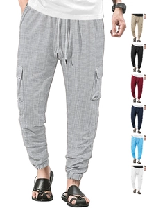Detail view of drawstring waist and side cargo pockets on checkered casual pants for men