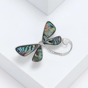 Elegant silver dragonfly brooch with iridescent abalone shell wings and crystal accents