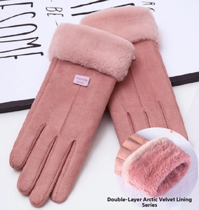 Detail of pink winter gloves showing thick double-layer polar fleece lining for warmth