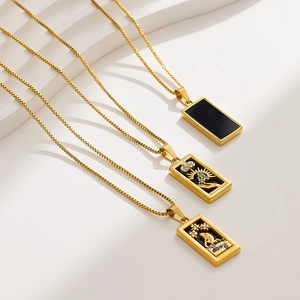 Vintage gold tarot pendant necklaces featuring moon and heart designs with zircon accents
