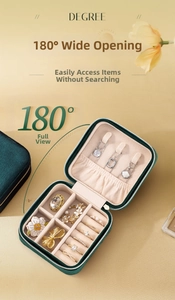 Detail view of velvet jewelry box with 180 degree flat opening and storage slots