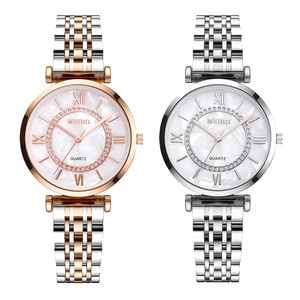 Women's two-tone steel strap watch with Roman numeral dial and rhinestone ring