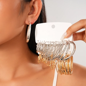 16-piece set of geometric twisted hoop earrings in gold and silver metal finish