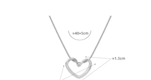Detail view of heart pendant necklace with snake chain and size markings of 45cm and 1.5cm