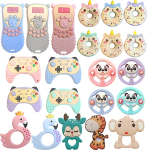 Collection of various silicone baby teethers in remote control and animal shapes