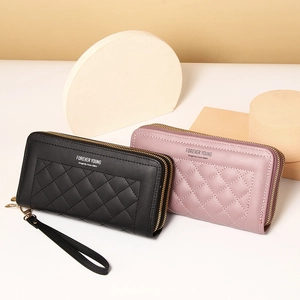 Dual long wallets with double zippers in black and pink featuring quilted PU leather