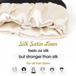 Detailed view of the champagne silk satin liner inside a knitted winter beanie for hair care