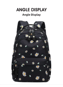 Detail view of the daisy print pattern on the black lightweight student backpack