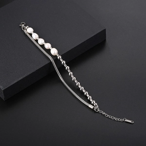 Double-layered titanium steel bracelet with irregular pearls and silver snake chain