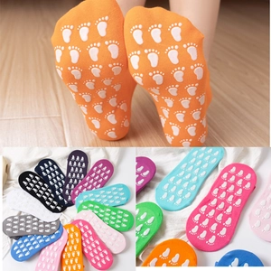 Non-slip trampoline socks for adults and kids in vibrant colors with grip soles