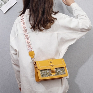 Yellow faux leather crossbody bag with ethnic embroidery strap and tweed panel