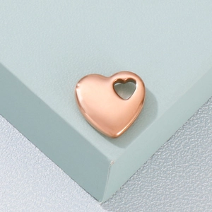 Pendentif cœur en acier inoxydable or rose poli avec détail ajouré élégant