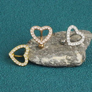 Fashionable heart-shaped navel rings in gold, rose gold, and silver finishes with zircons