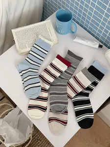 Detailed flat lay of striped mid-calf socks set in five assorted vintage colors