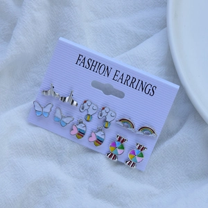 Detail of children's six-pair colorful enamel earring set with cute animal and rainbow designs