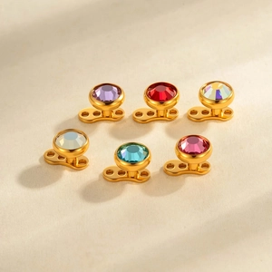 G23 Titanium dermal anchor set with six colorful zircon stones in gold plated metal