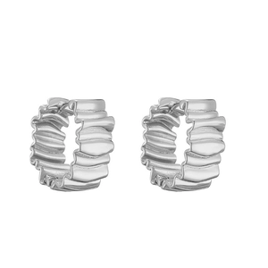 Detailed close-up of silver irregular wavy textured hollow metal stud earrings