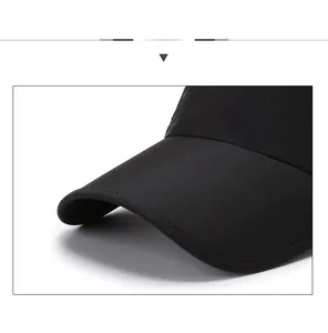 Detail of sturdy black baseball cap brim with a built-in interlayer for shape retention