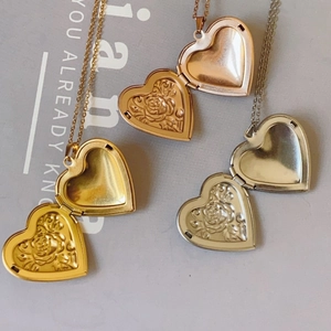 Locket necklace with heart pendant and rose engraving in gold silver and rose gold