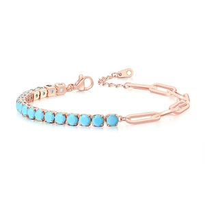 Detailed view of rose gold paperclip chain and blue zircon tennis bracelet with lobster clasp