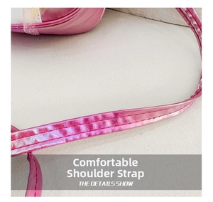 Detail of pink metallic synthetic leather strap with durable double stitching on bag