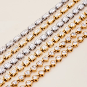 Minimalist 18K gold and silver tennis bracelets with square and heart zirconia stones