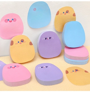 Detail of colorful cartoon sticky notes in pastel shades with cute facial expressions