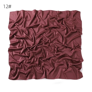Solid color satin square scarf, smooth fabric, elegant draping design, perfect accessory.