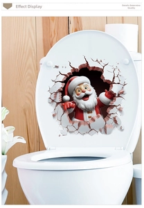 Close-up of 3D Santa Claus toilet lid sticker decoration for festive bathroom decor