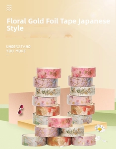 Detail of floral and geometric Washi tape rolls featuring elegant gold foil stamping accents