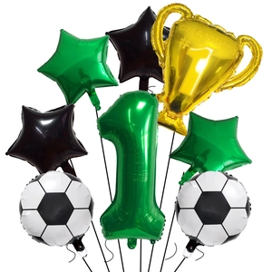 Detail of football trophy balloon set with number one and star foil decorations