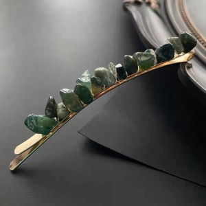 Retro gold hair clip featuring natural green crystal stones and artisanal wire wrap