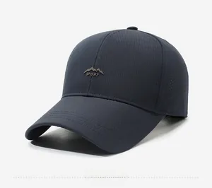 Detail of navy blue quick-dry fabric and laser-cut vents on the sport baseball cap