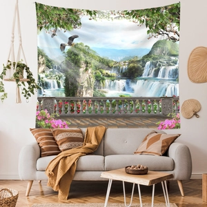 Detail view of large wall tapestry featuring a majestic eagle over mountain waterfalls