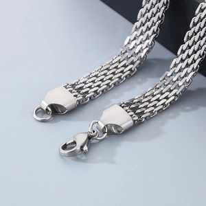 Close-up of silver flat braided snake chain with lobster clasp in polished stainless steel